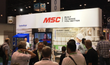 Photo of MSC's booth in a room filled with people